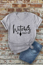 Load image into Gallery viewer, Witches be crazy, Halloween, Unisex Round Neck T-Shirt: Black/Orange / M
