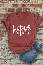 Load image into Gallery viewer, Witches be crazy, Halloween, Unisex Round Neck T-Shirt: Black/Orange / S
