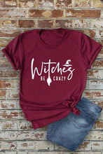 Load image into Gallery viewer, Witches be crazy, Halloween, Unisex Round Neck T-Shirt: Black/Orange / L
