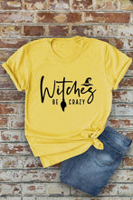 Load image into Gallery viewer, Witches be crazy, Halloween, Unisex Round Neck T-Shirt: Black/Orange / M
